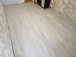 Укладка ламината в 3 комнатной квартире в Санкт-Петербурге — фото выполненной работы 6