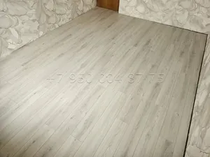 Укладка ламината в 3 комнатной квартире в Санкт-Петербурге — фото выполненной работы 4