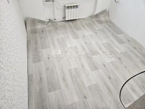 Укладка линолеума на кухне и коридоре в Санкт-Петербурге — фото выполненной работы 1