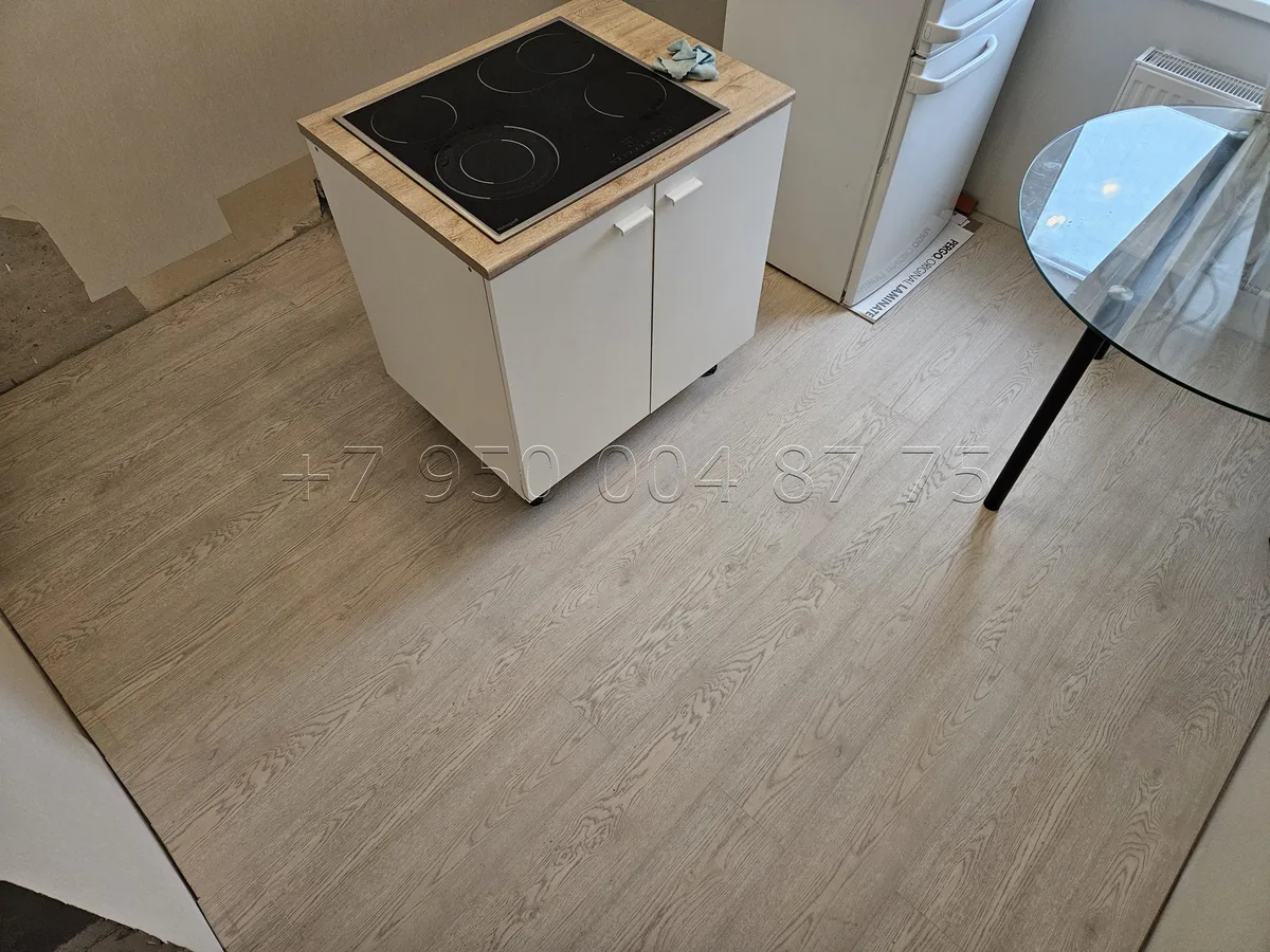 Укладка ламината на кухне — фото выполненной работы