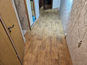 Укладка линолеума в коридоре в Санкт-Петербурге — фото выполненной работы 1