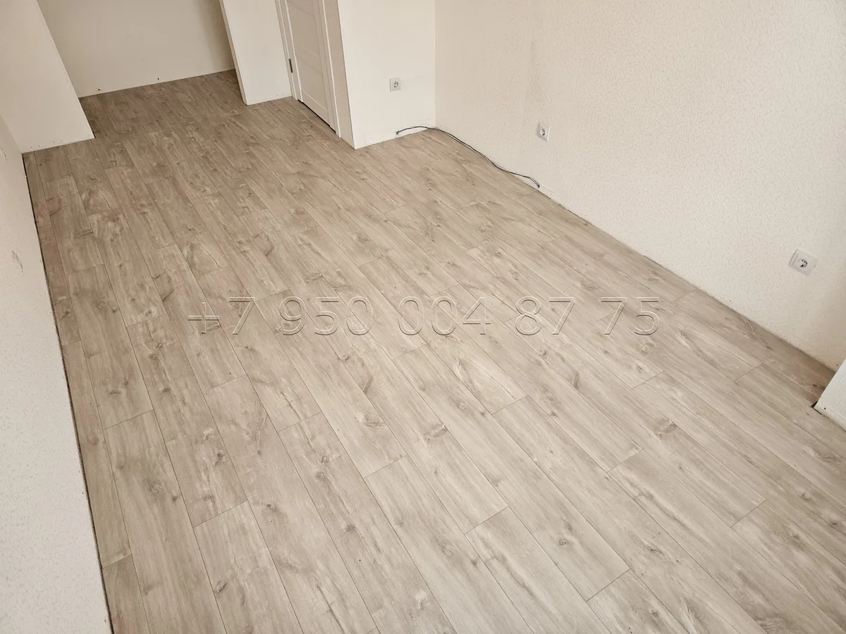 Укладка ламината — фото выполненной работы