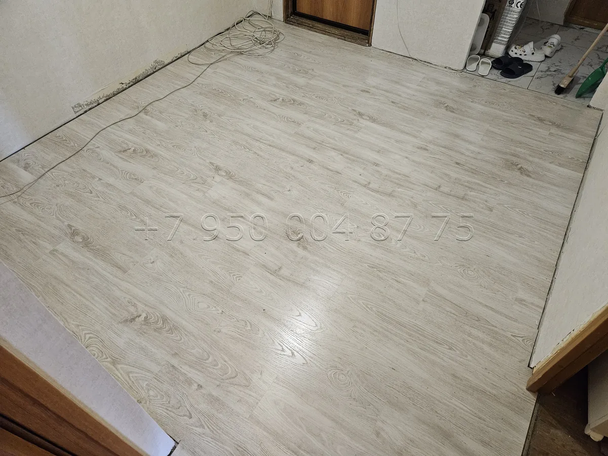 Укладка ламината в комнате и коридоре — фото выполненной работы